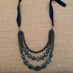 Blue crystal necklace with ribbon closure